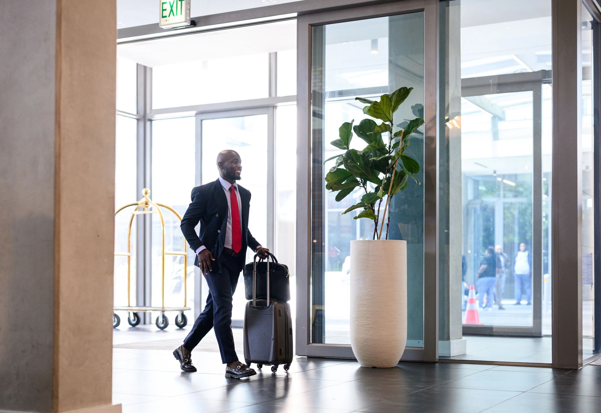 Director of destination partnerships arriving at a premium hotel